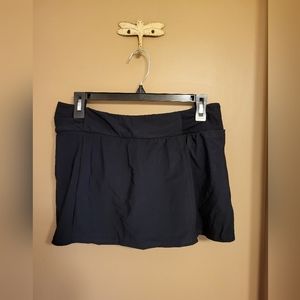 Christina. Swimskirt NWOT. Black. Size 10.
